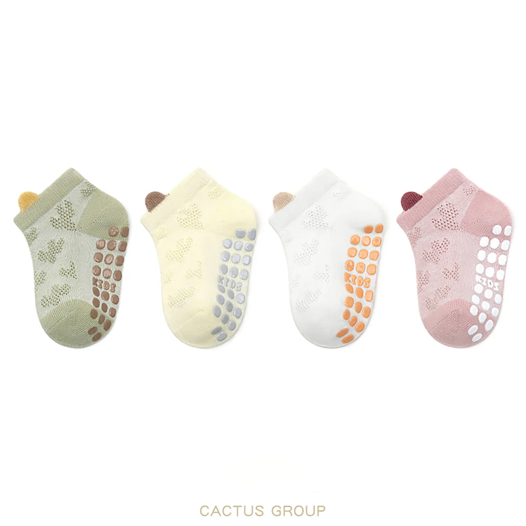 Chaussettes antidérapantes bébé – Lot de 4 paires (0-6 ans)